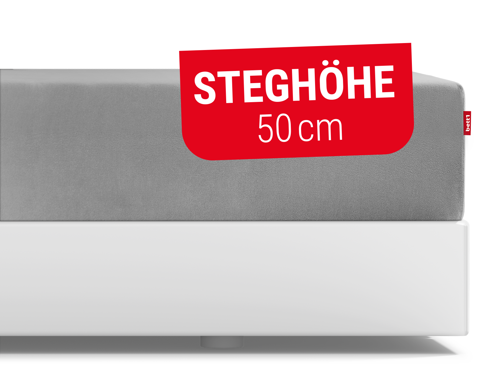 Das BODYGUARD® Spannbettlaken extra hoch aufgezogen auf der BODYGUARD® Boxspring Matratze. Text: Steghöhe 50cm	