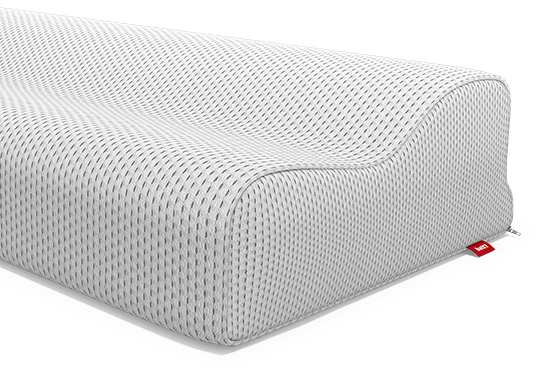 Almohada BODYGUARD con funda Hybreeze y etiqueta roja en la esquina.