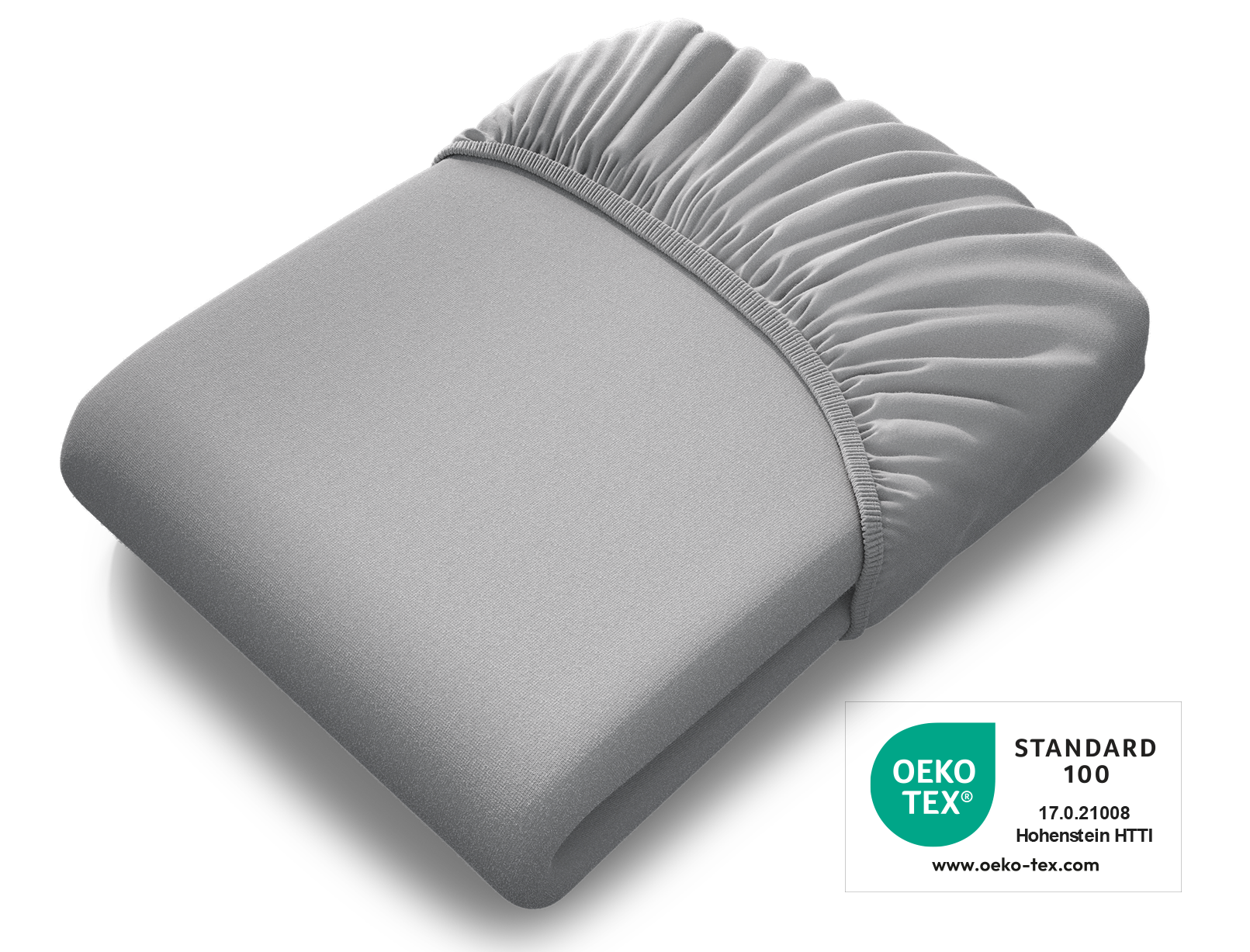 La sábana ajustable extra alta BODYGUARD® doblada, con el sello Oeko-Tex® Standard 100 encima.