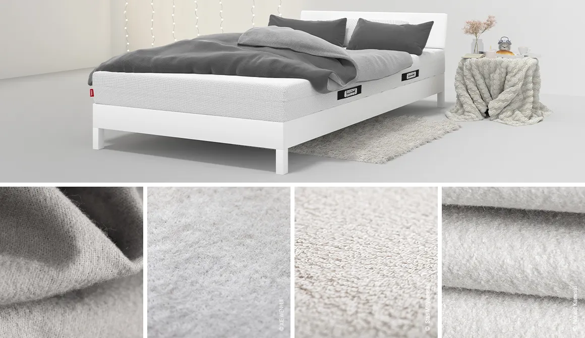 Sobre una cama yacen sábanas cubiertas con ropa de cama de invierno, que incluyen cuatro baldosas centradas en distintos tipos de ropa de cama de abrigo.