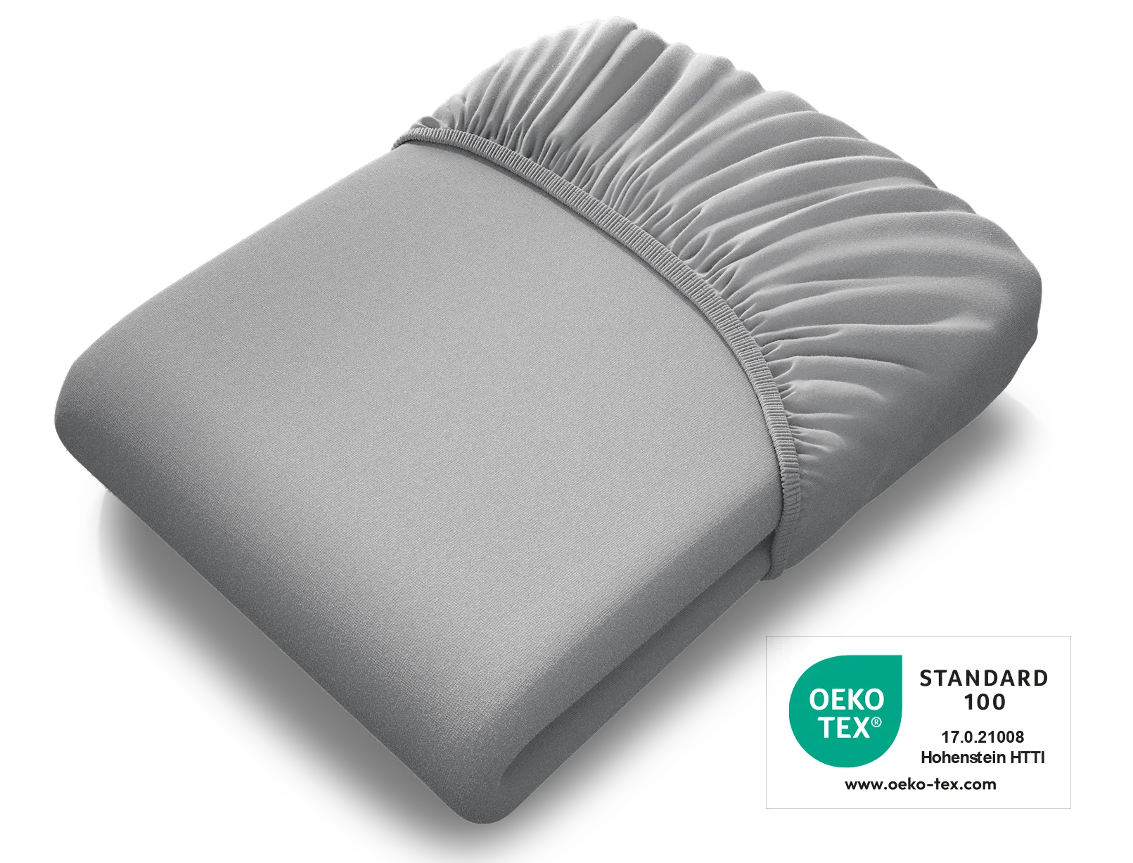La sábana ajustable extra alta BODYGUARD® doblada, con el sello Oeko-Tex® Standard 100 encima.