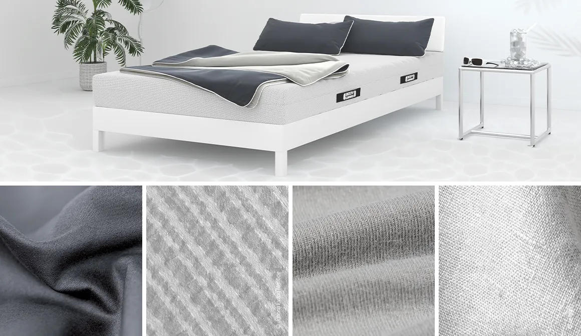 Sobre una cama yacen sábanas cubiertas con ropa de cama de verano, que incluyen cuatro baldosas centradas en distintos tipos de ropa de cama lisa.