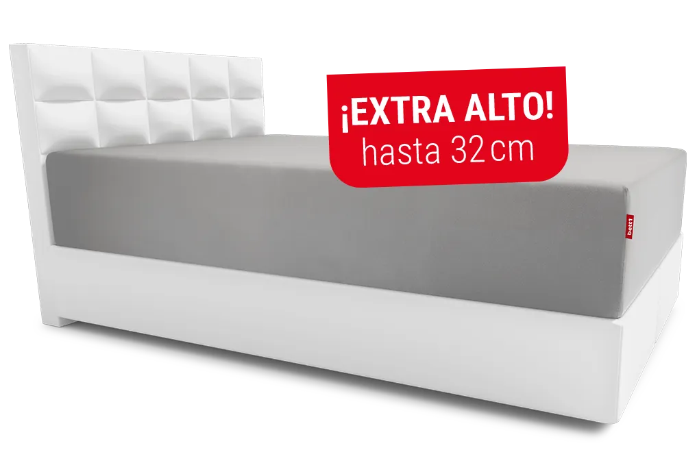 Imagen de una sábana bajera ajustada en un colchón extra alto (hasta 32 cm), destacada con una etiqueta roja que indica "Extra alto"
