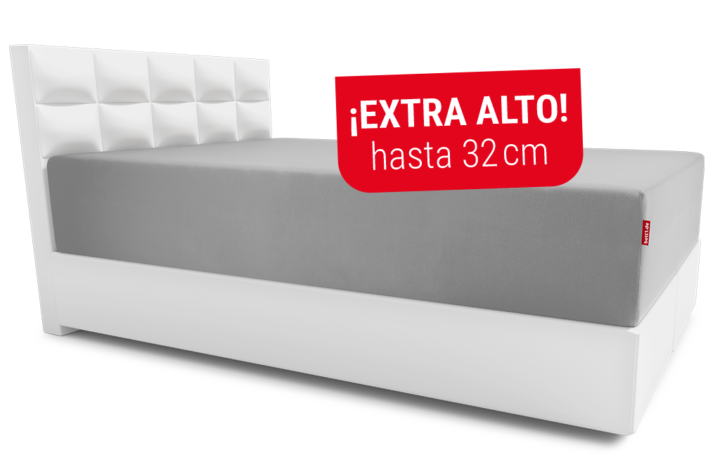 Imagen de una sábana bajera ajustada en un colchón extra alto (hasta 32 cm), destacada con una etiqueta roja que indica "Extra alto"