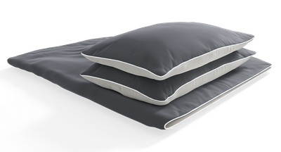 Juego de funda nórdica BODYGUARD de bett1.es doblado, mostrando un diseño en tonos oscuros y modernos, con fundas de almohada incluidas.